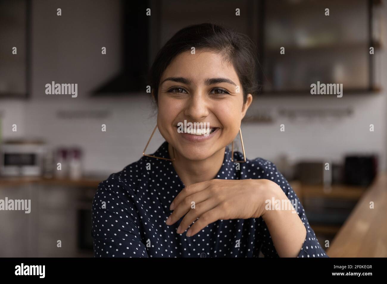 Head shot portrait smiling Indian woman making video call Stock Photo ...