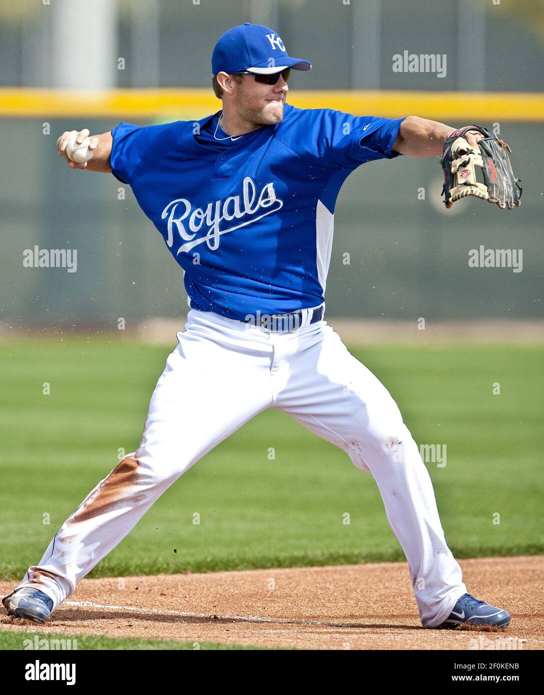 Kansas City Royals' third baseman Alex Gordon makes the throw to first  base for the final out in the eighth inning in the team's first  intrasquad game of spring training in Surprise