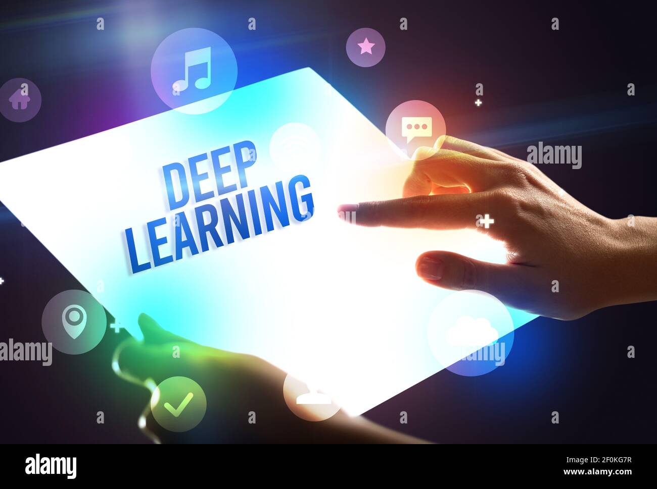 Holding futuristic tablet with DEEP LEARNING inscription, new ...