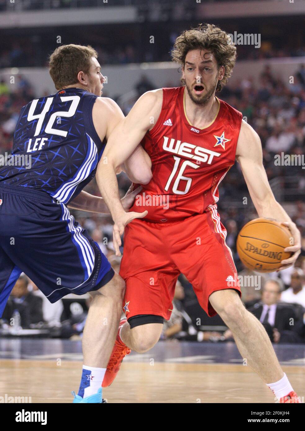 The West s Pau Gasol drives on the East s David Lee