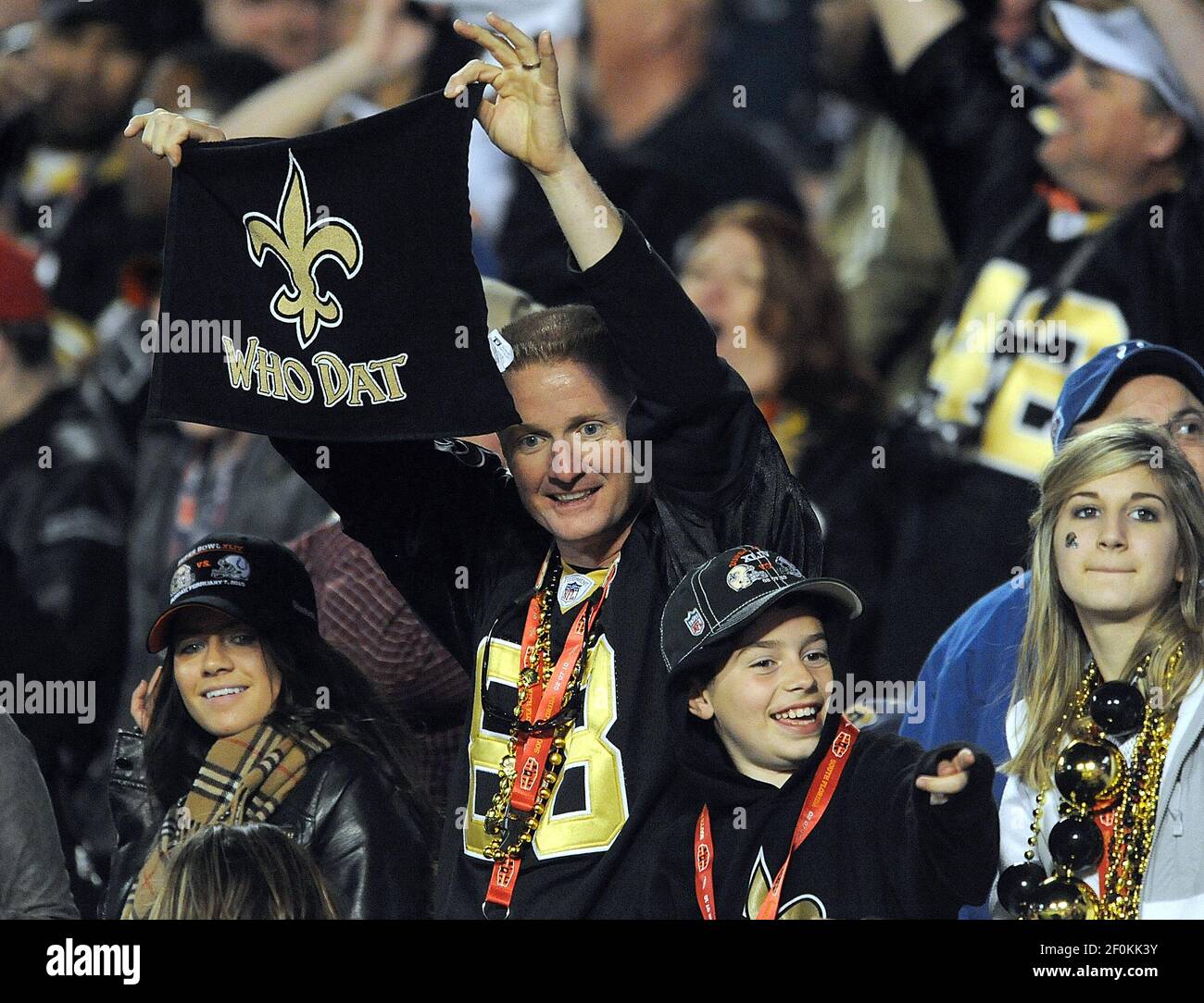 Saints fans hold up the Who Dat flag as the New Orleans Saints beat the  Indianapolis Colts 31-17, Sunday, February 7, 2010 in Super Bowl XLIV at  Sun Life Stadium in Miami