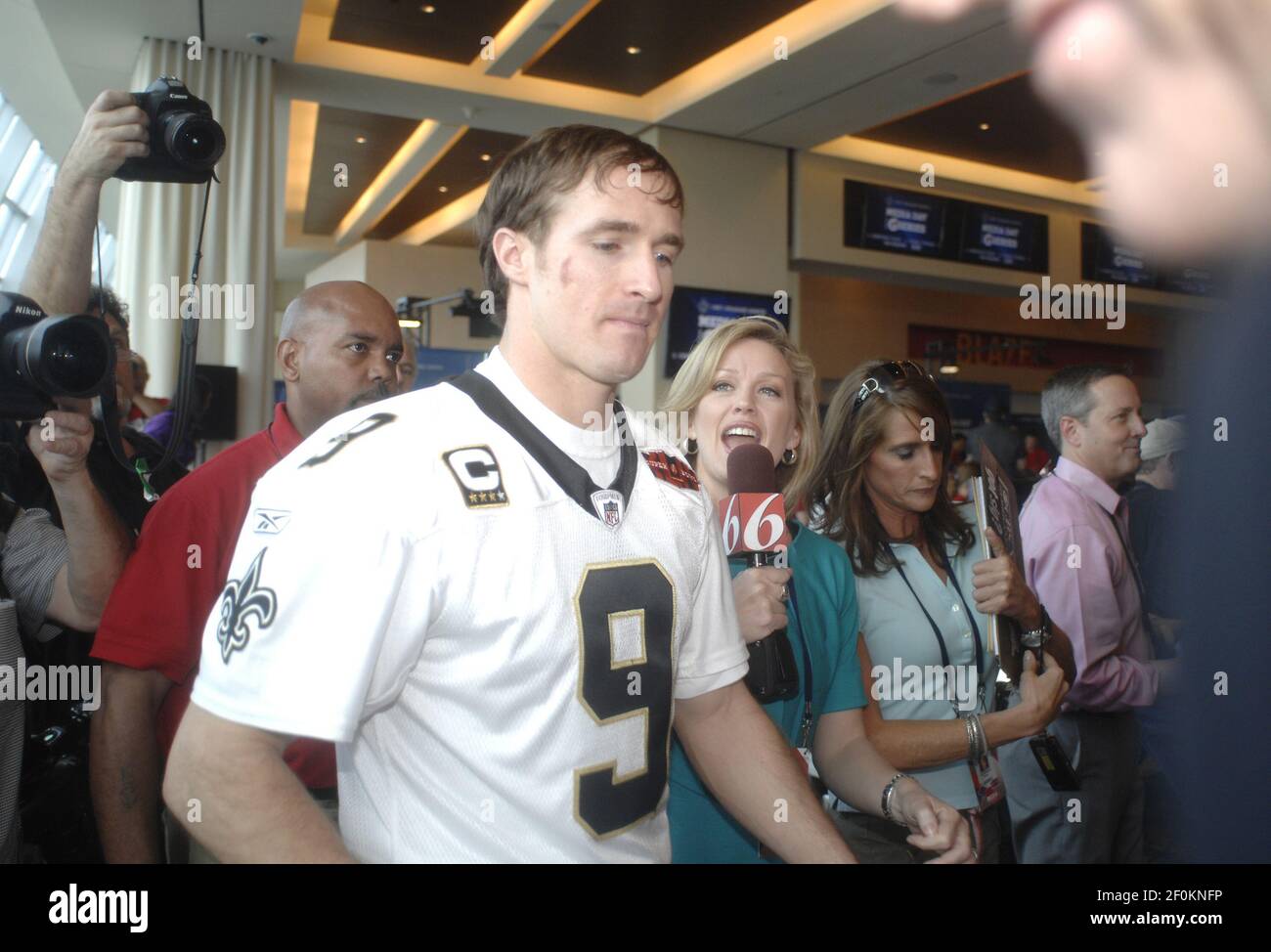 Members Of The Media Surround New Orleans Saints Quarterback Drew Brees