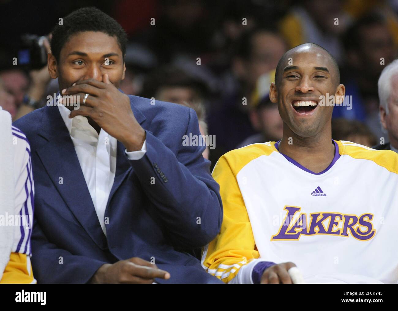 Los Angeles Lakers small forward Ron Artest (15) and Kobe Bryant share a  laugh against the New Orleans Hornets during the first half of Game 2 of  their Western Conference Playoff series