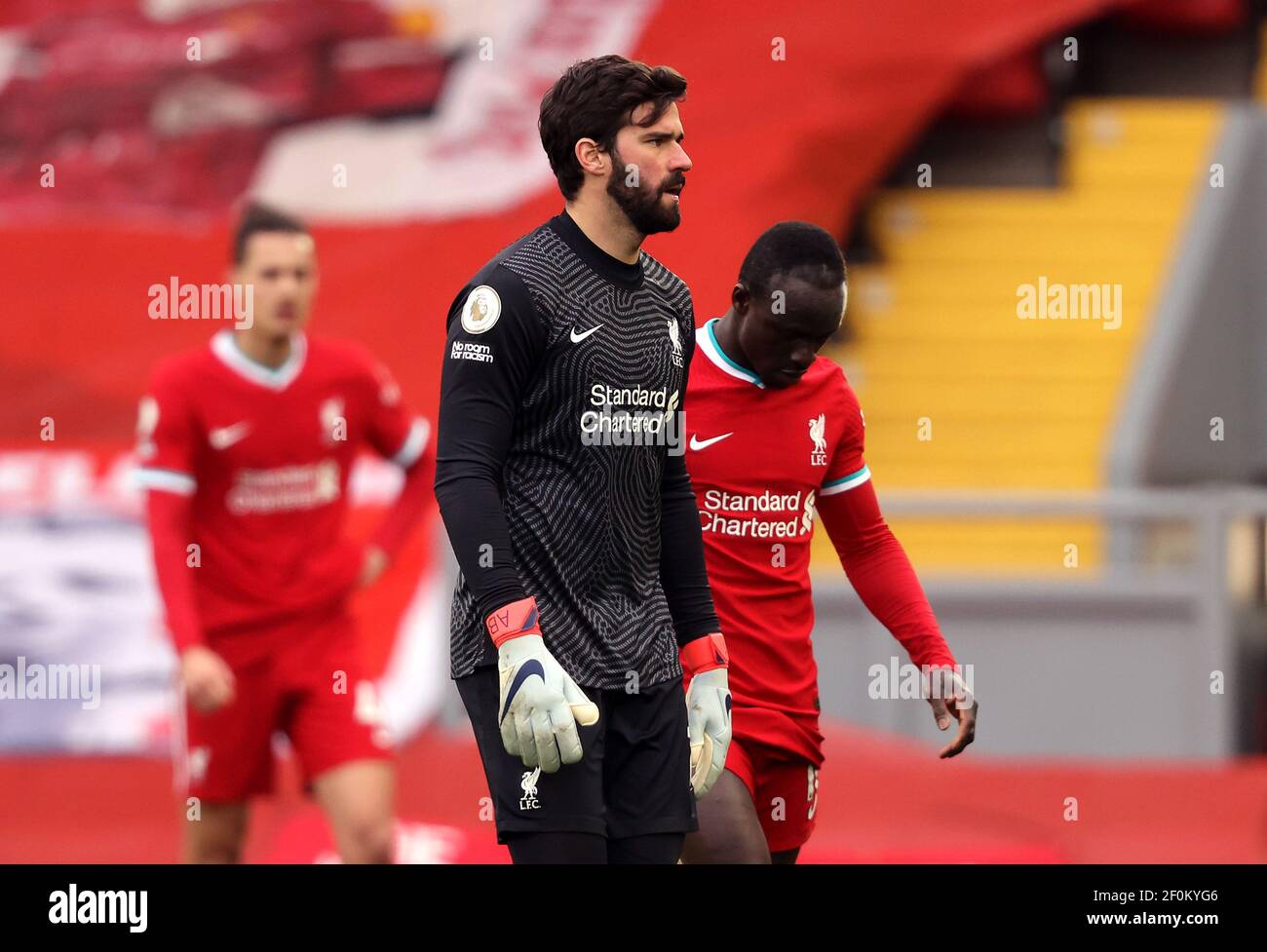 Liverpool goalkeeper Alisson appears dejected after losing the Premier ...