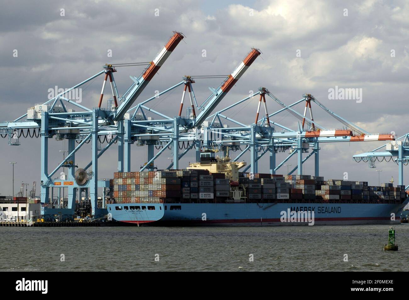 Container ships of the Maersk Sea Land lines load in Port Elizabeth, NJ on  May 20, 2006. A.P. Moeller-Maersk is one of the companies hit by a  cyberattack. (Photo by Richard B.
