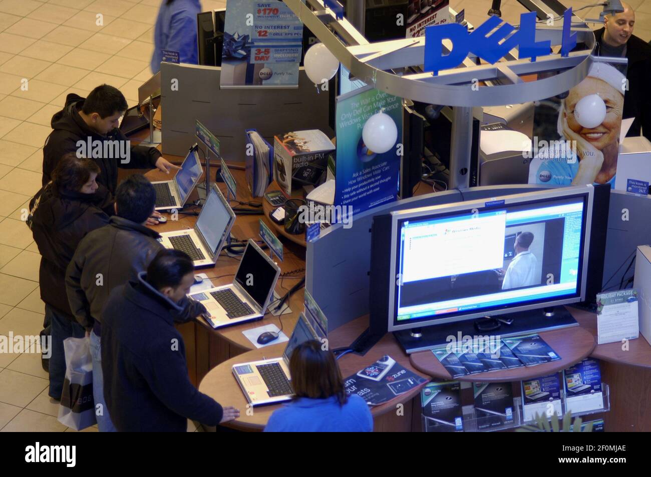 A Dell computer kiosk selling their products to shoppers at the Queens ...
