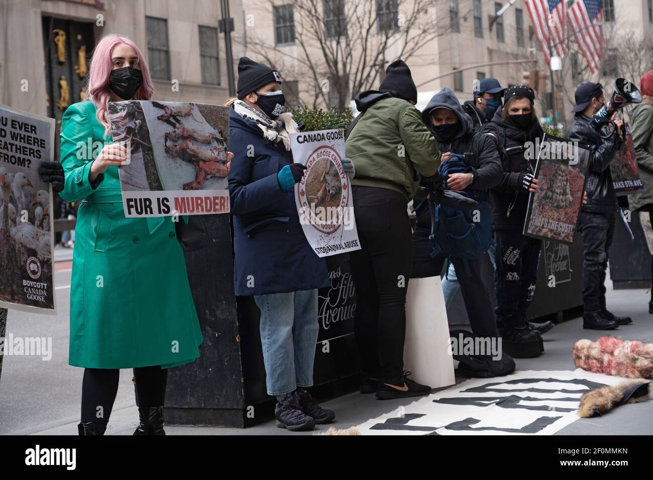New York, United States. 06th Mar, 2021. Activists hold placards during the  demonstration.Animal rights activists held a peaceful protest in front of  Saks Fifth Avenue. Protest against the Canada goose brand specifically,