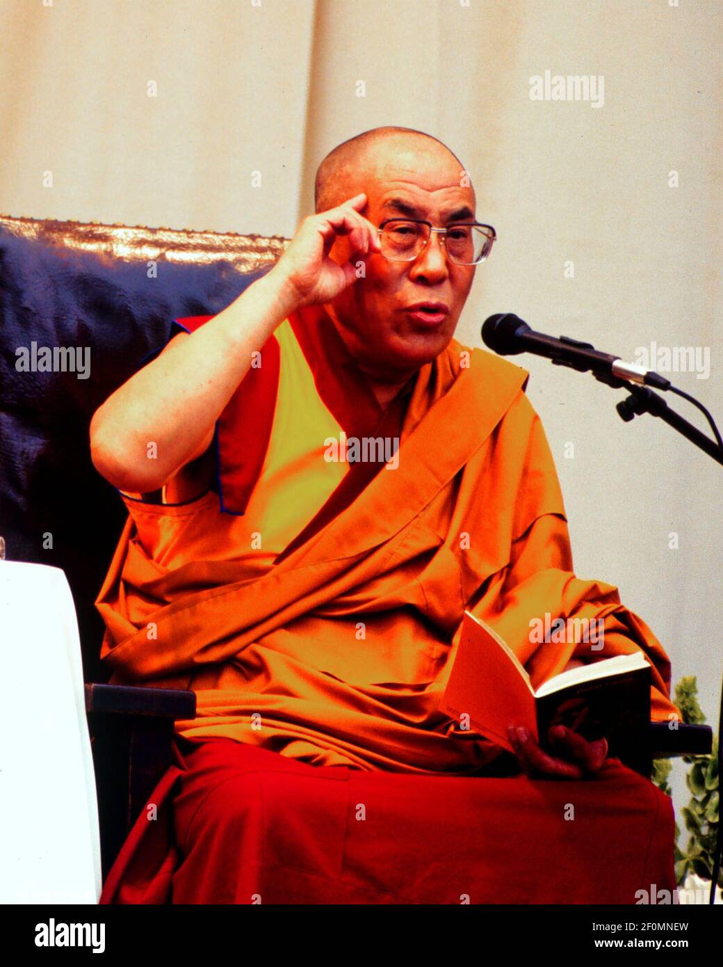 The Dalai Lama gives free lecture in New York City's Central Park East  Meadow on August 15, 1999. The Dalai Lama is the spiritual leader of the  Tibetan Buddhists and is in