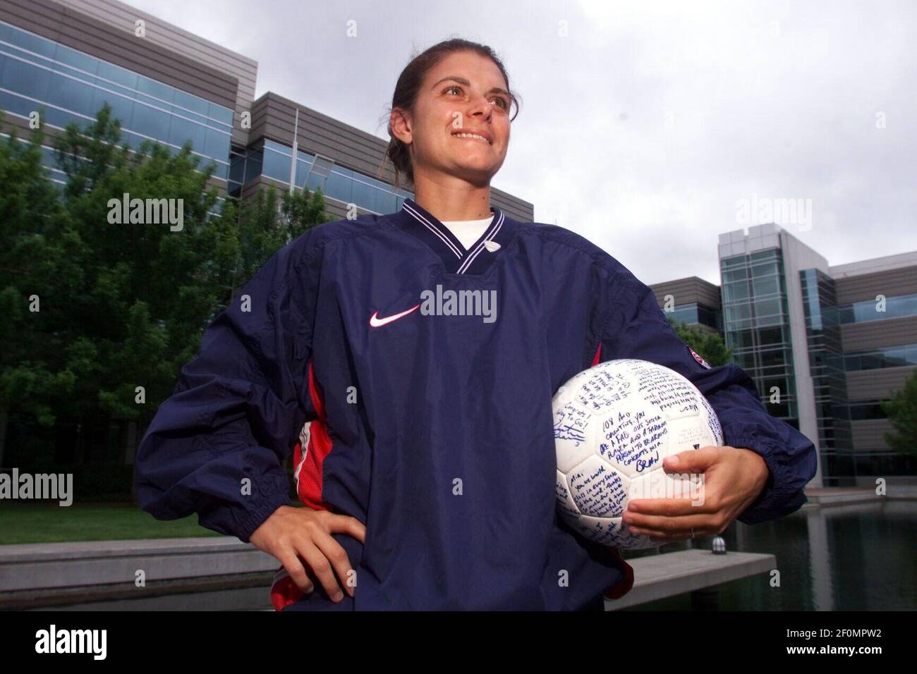 June 3, 1999; Beaverton, OR, USA; US soccer player Mia Hamm with a ball  autographed by her teammates to commemorate the dedication of a building in  her name at the Nike World