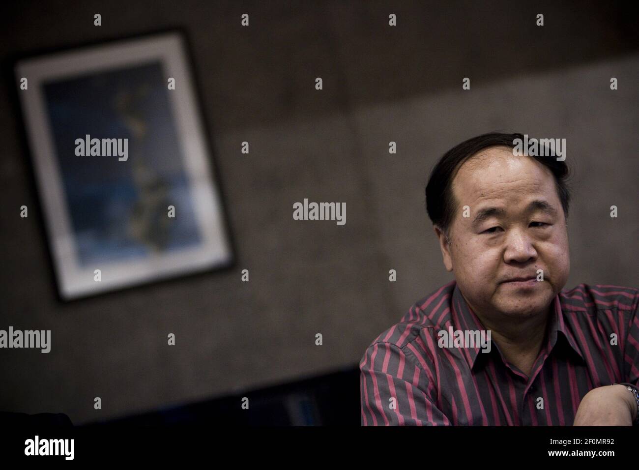 Chinese writer Mo Yan, laureate of the 2012 Nobel Literature Prize, is interviewed in Beijing, China, 18 June 2009. Chinese Nobel laureate Mo Yan was awarded an honorary doctorate from Peru's Pontifical Catholic University (PUCP) on Tuesday (30 July 2019). The 2012 Nobel Prize laureate for literature received the honor for his literary contributions and the impact of his works in both China and Latin America, the university said. (Photo by wang xiao dong - Imaginechina/Sipa USA) Stock Photo