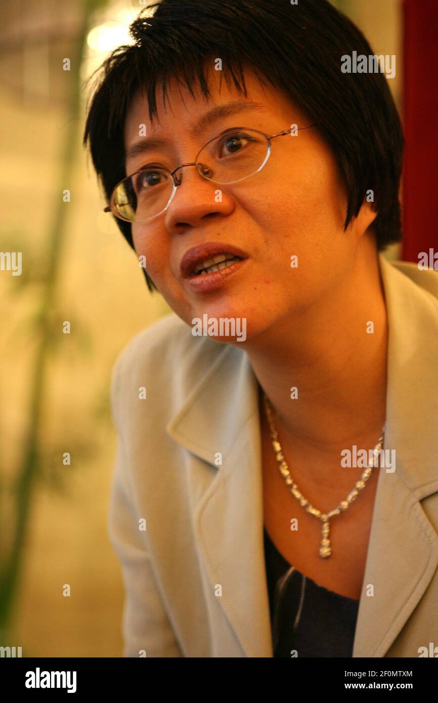 --FILE--Chairwoman of Chinese electronic commerce company Dangdang Peggy Yu, is interviewd during an awarding ceremony in Xi'an city, northwest China's Shaanxi province, 3 June 2006. Chairwoman of Chinese electronic commerce company Dangdang Peggy Yu, also known as Yu Yu, and her ex-husband Li Guoqing, both co-founders of Dangdang, quarrel against each other in the Internet, revealing secrects and gossips about their business, life and marriage. Stock Photo