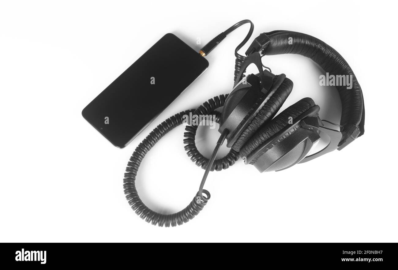 White headphone smartphone music Cut Out Stock Images & Pictures - Alamy
