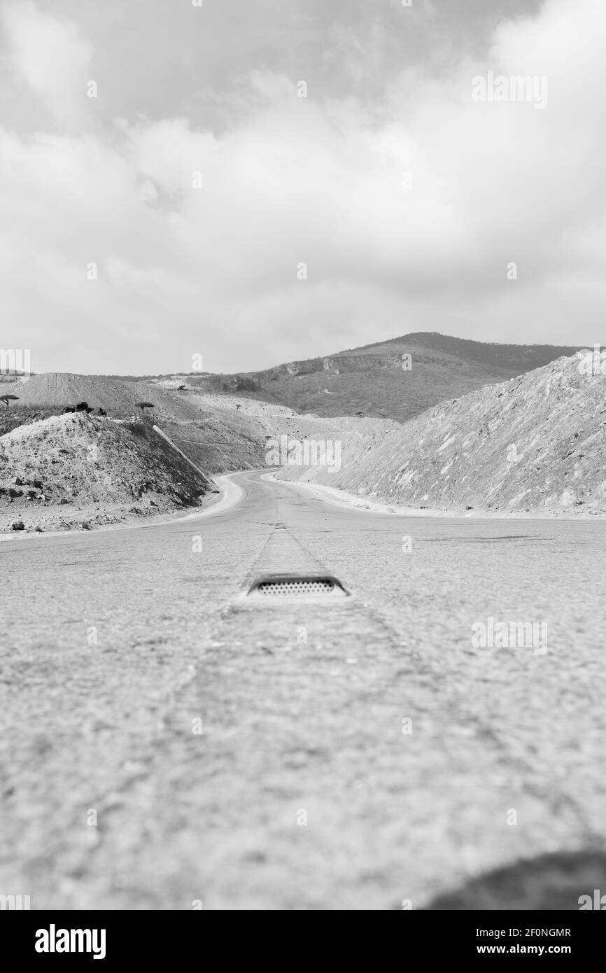 In oman asphalt street white line and mountain panorama Stock Photo
