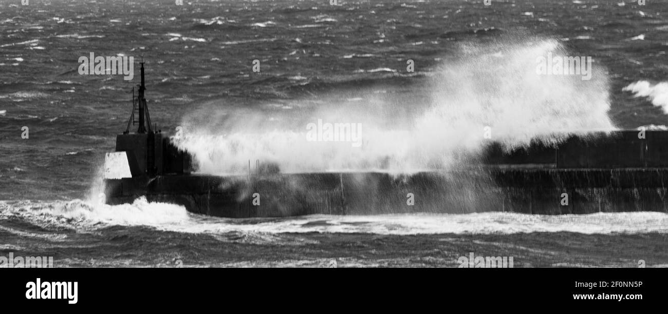 rough seas over the wall  Raymond Boswell Stock Photo