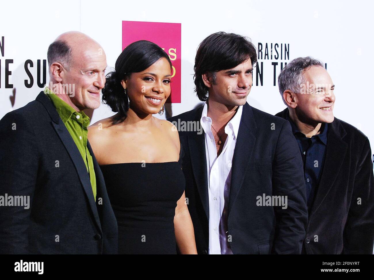 John Stamos and Sanaa Lathan. 11 February 2008 Los Angeles