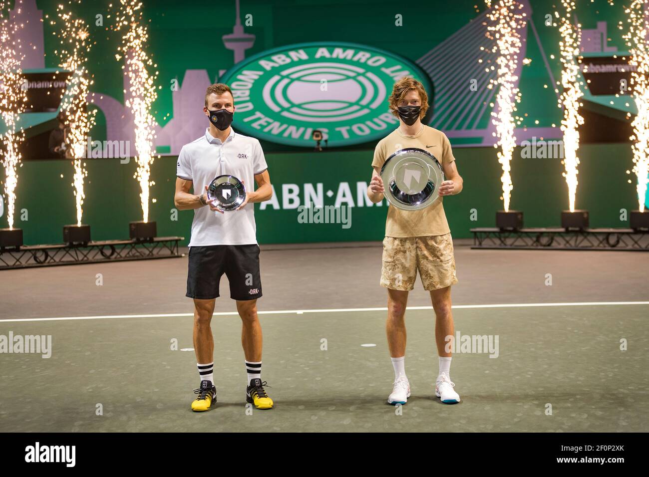 rotterdam-the-netherlands7-march-2021-abnamro-world-tennis-tournament-ahoy-final-finalist-andrey-rublev-rus-l-and-runner-up-marton-fucsovics-r-receive-price-photo-wwwtennisimagescom-2F0P2XK.jpg