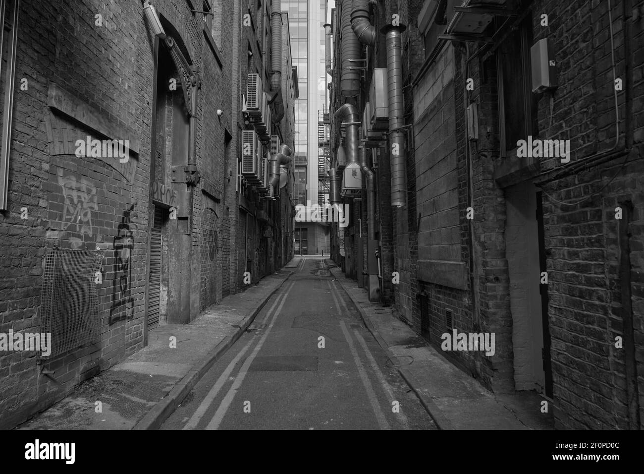 The empty narrow side streets of Manchester city centre, UK Stock Photo