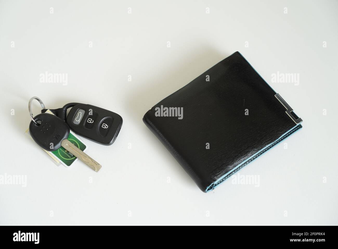 wallet car keys on a white background Stock Photo Alamy