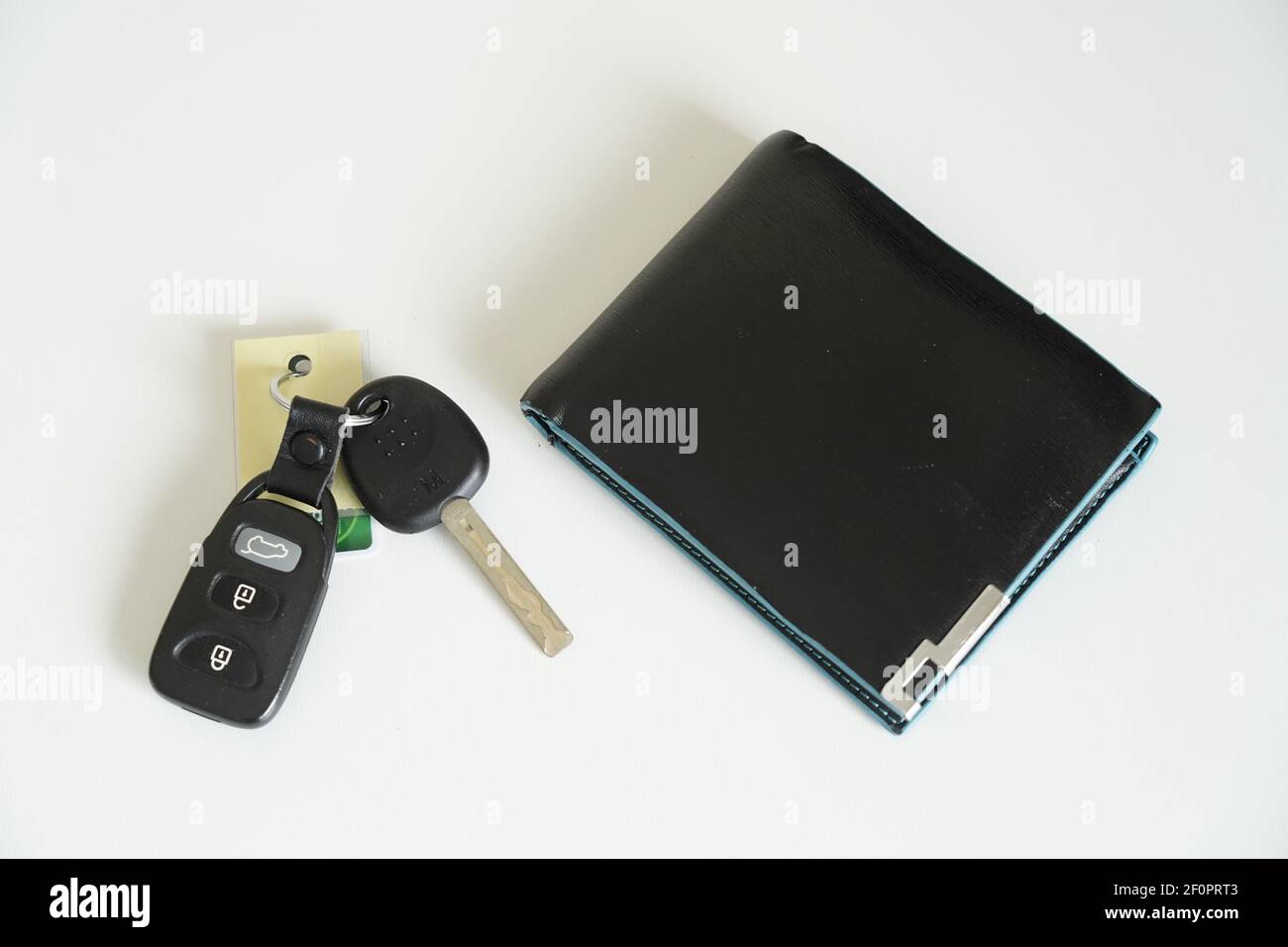 wallet car keys on a white background Stock Photo