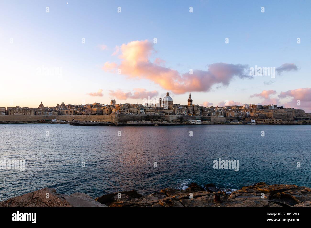 Valletta Malta Scenic City Skyline And Waterfront Basilica In The valletta-malta-scenic-city-skyline-and-waterfront-basilica-in-the