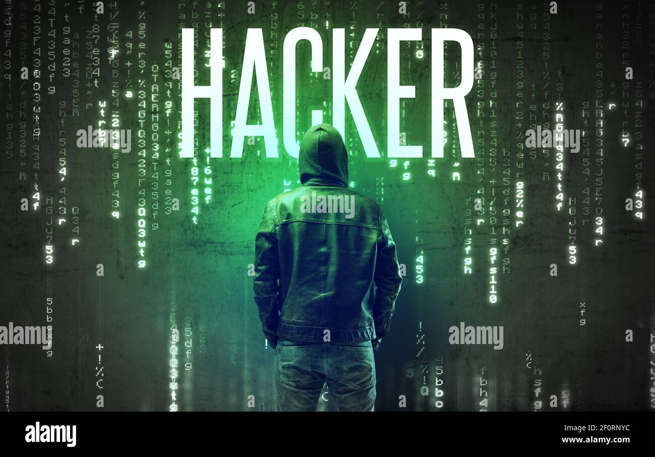 Faceless hacker with HACKER inscription, hacking concept Stock Photo