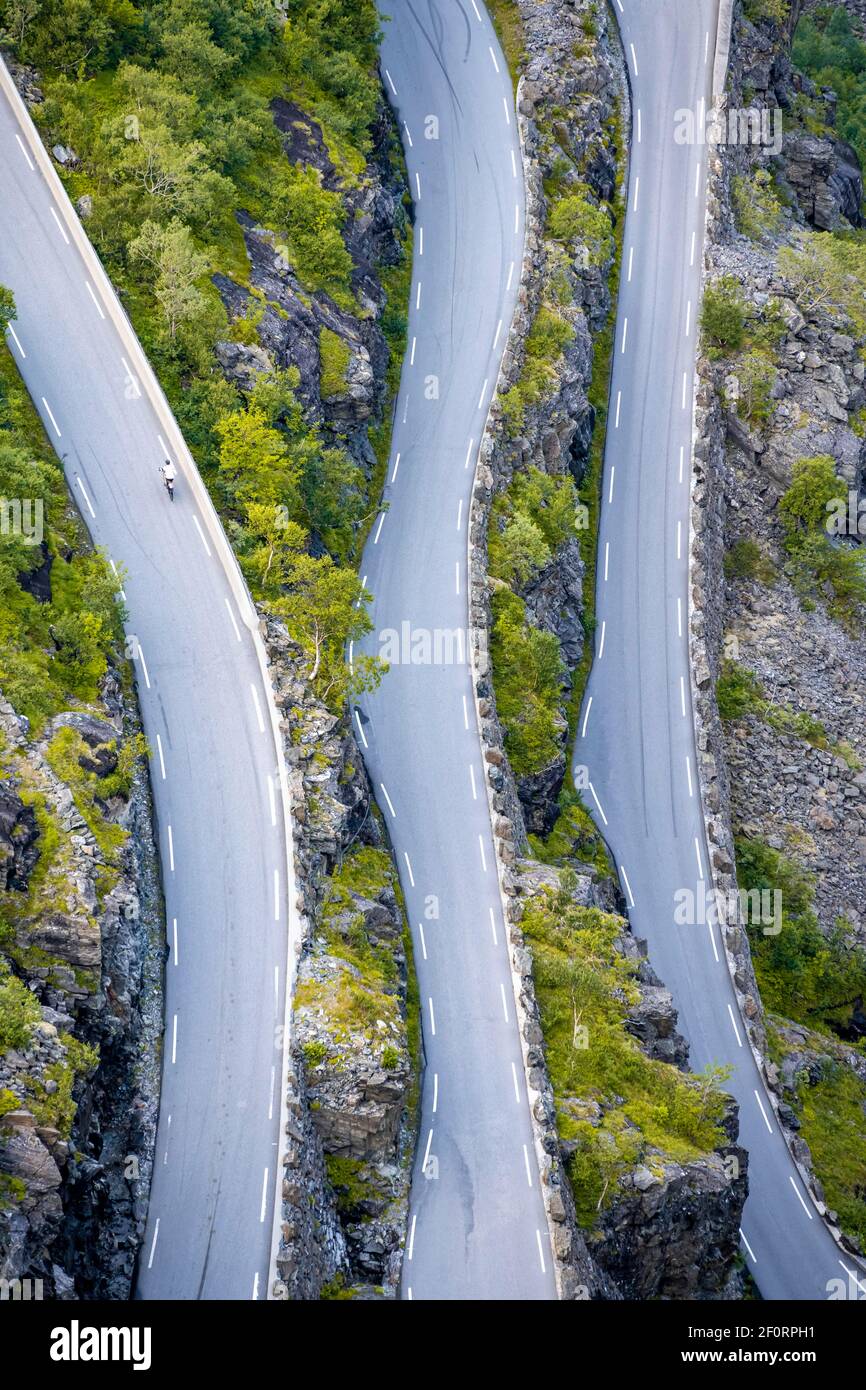 Cyclist on the mountain road Trollstigen, near Andalsnes, More og Romsdal, Vestland, Norway Stock Photo