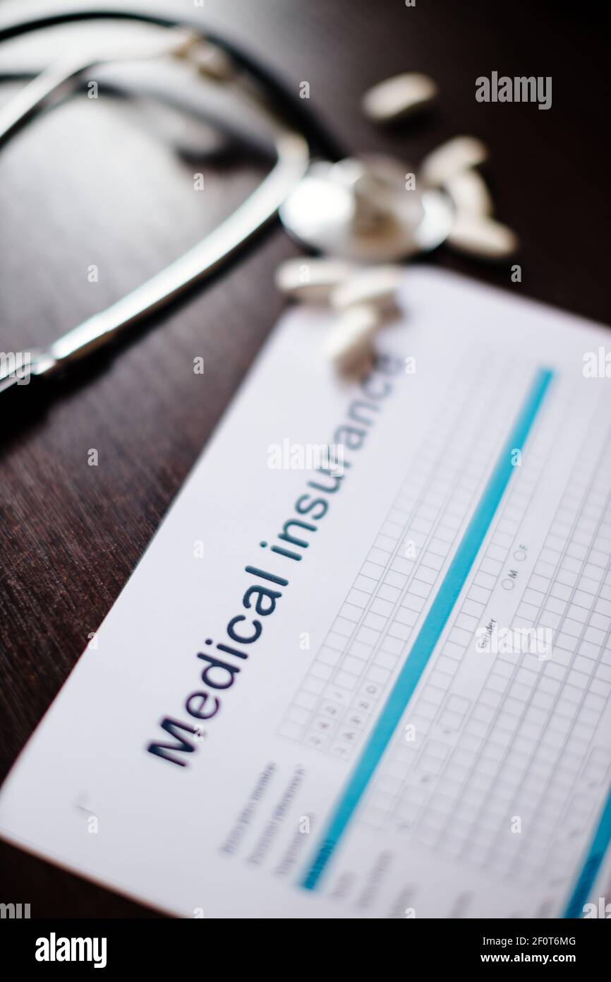 health insurance policy Stock Photo - Alamy