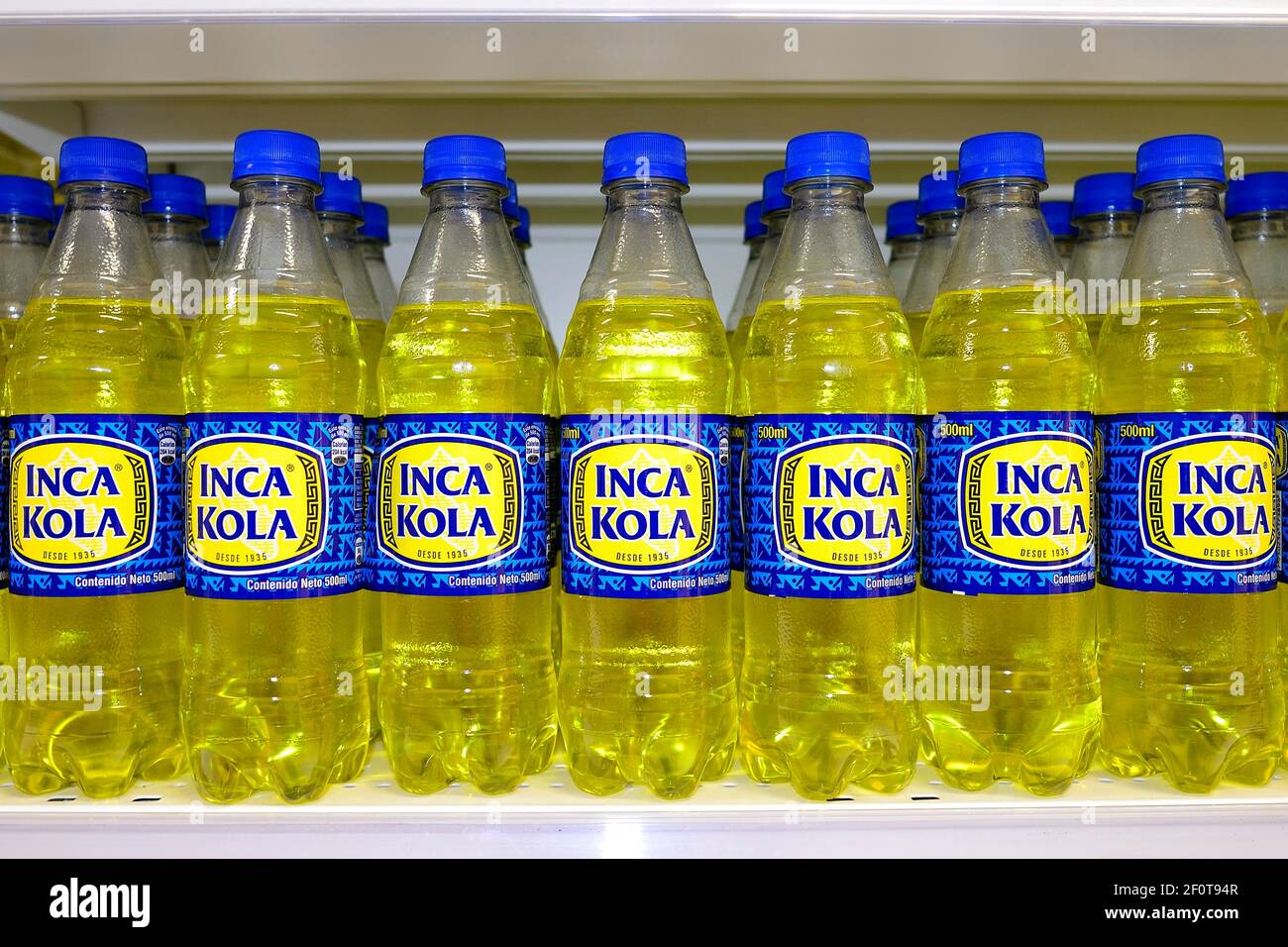 Shelf in a supermarket with Peru's most popular drink, Inca Cola