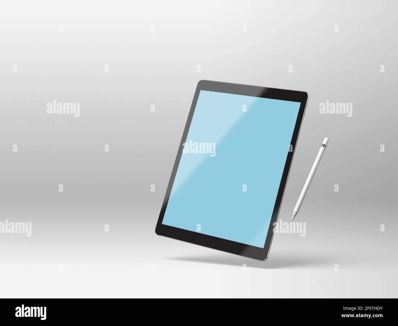 Black mockup tablet on a white background with stylus Stock Photo