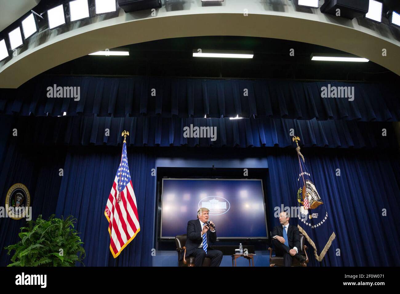 PresidentDonald Trump responds to a question during Q&A with Reed Cordish Assistant to the President for Intragovernmental and Technology Initiatives on Tuesday April 4 2017 during the CEO Town Hall on Unleashing American Business hosted by â€œThe White House Office of American Innovationâ€ in the EEOB South Court Auditorium of the White House in Washington D.C. Stock Photo