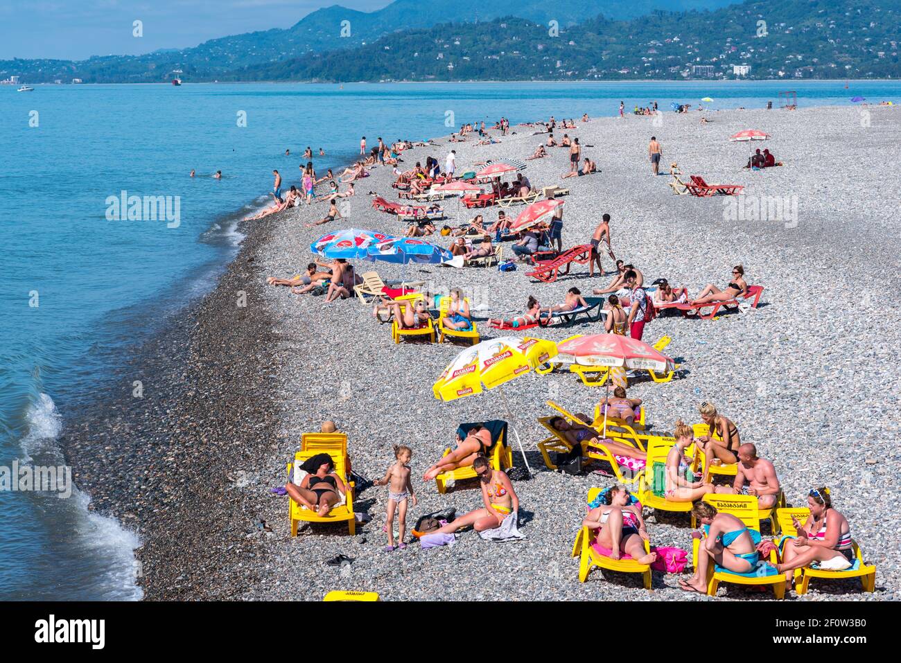Batumi, Georgia - June 6, 2016: people relax at Batumi City Beach. Stock Photo
