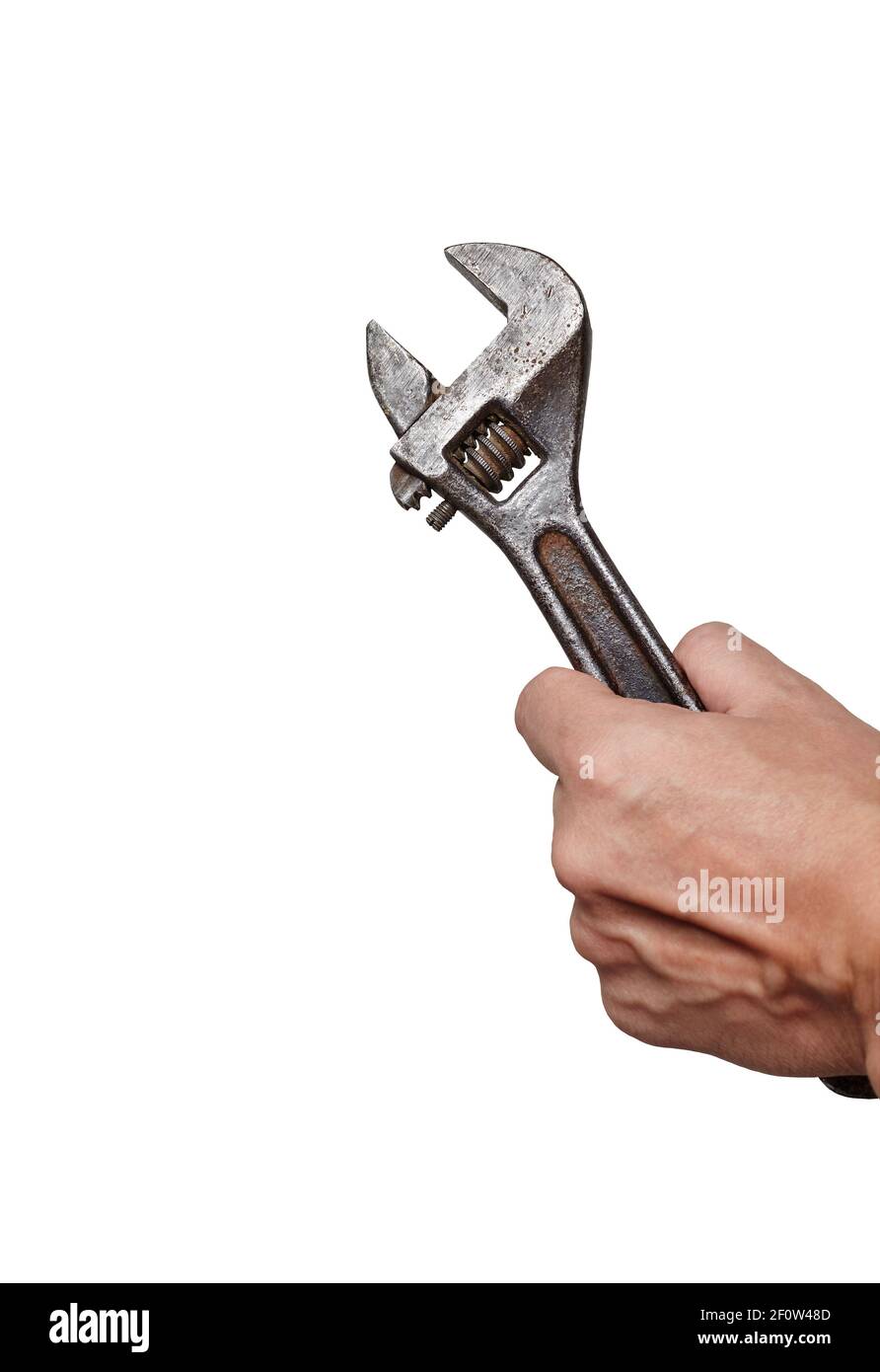 Human hand with adjustable wrench isolated on white background with clipping path. Copy space, no shadows Stock Photo