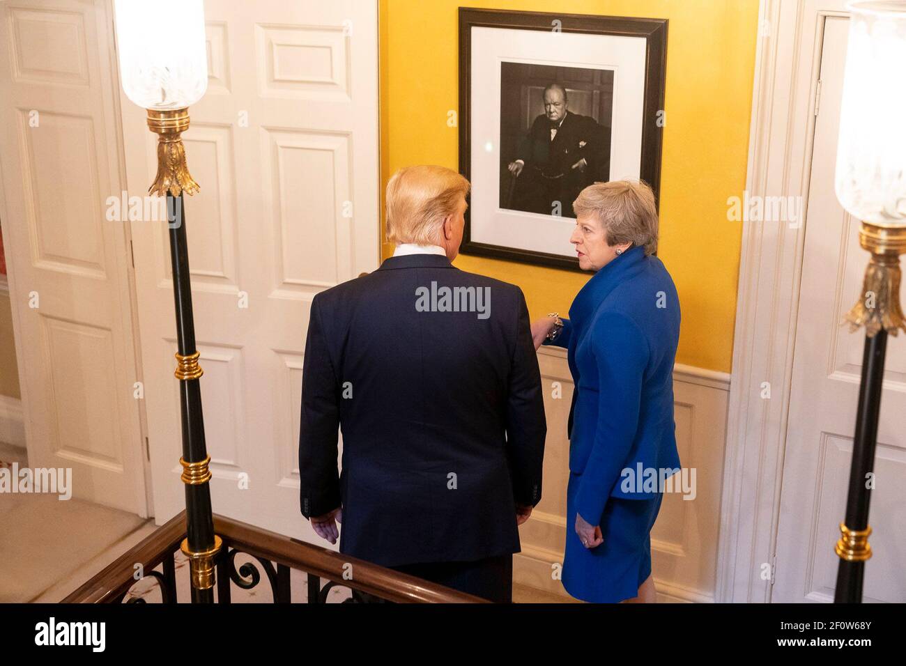 President Donald Trump and British Prime Minister Theresa May talk in front of a portrait of British Prime Minister Winston Churchill Tuesday June 4 2019 at No. 10 Downing Street in London. Stock Photo