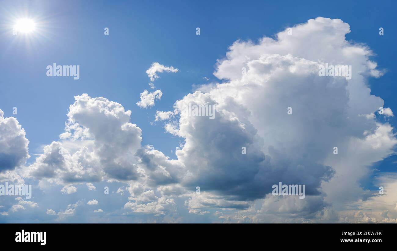 Dramatic white clouds on blue sky Stock Photo