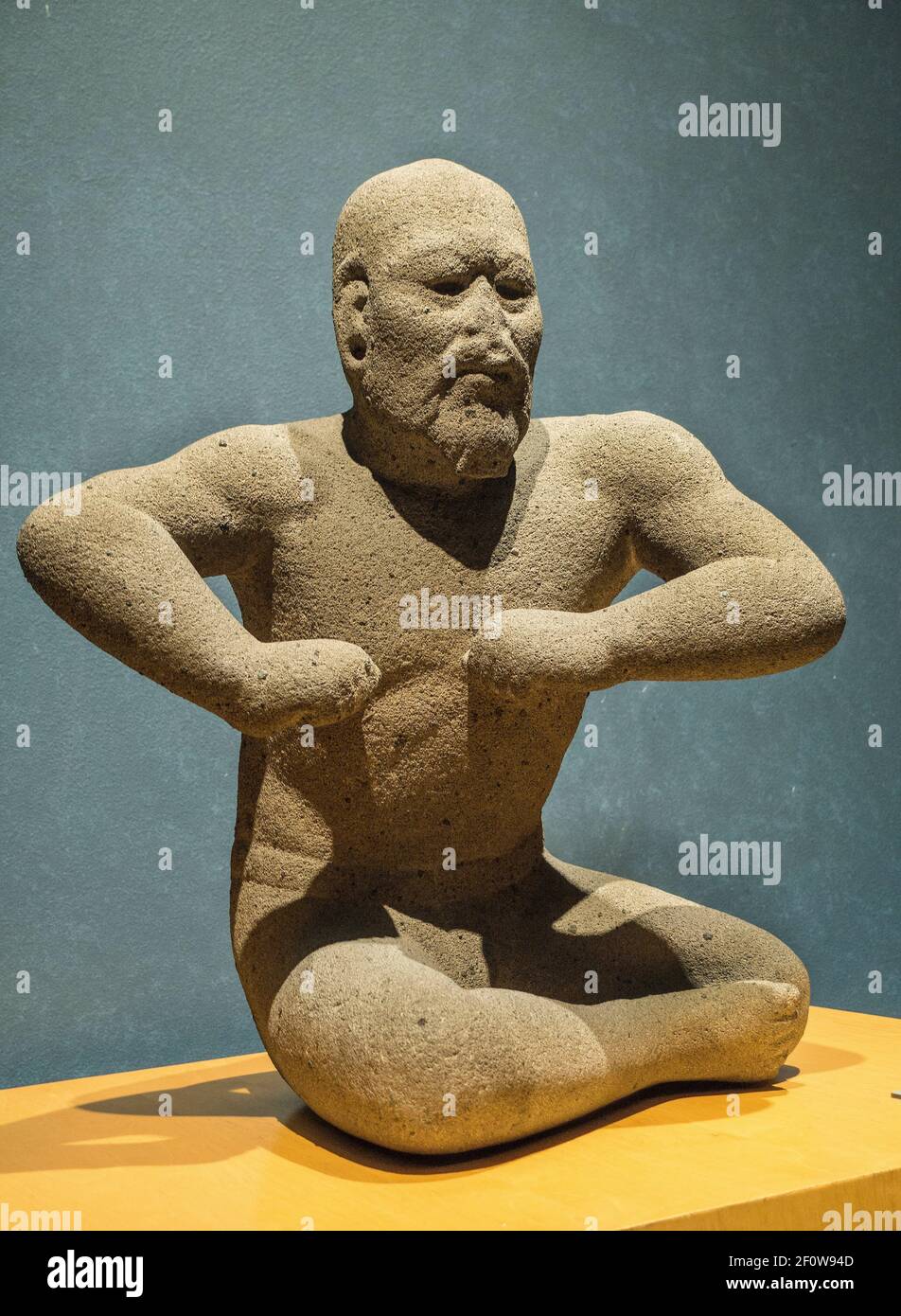The Wrestler, Prehispanic Olmec Stone statue in Anthropology Museum, Mexico City, Mexico Stock Photo