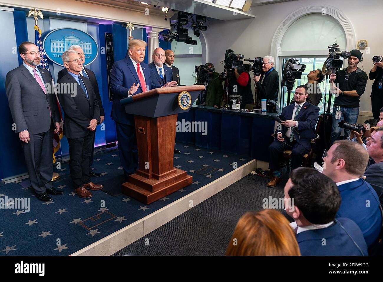 President Donald Trump joined by Vice President Mike Pence takes questions from reporters during a Coronavirus Task Force update Saturday Feb. 29 2020 in the James S. Brady Press Briefing Room of the White House. Stock Photo