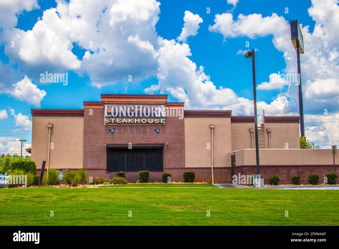 Conyers, Ga / USA 07 27 20 Back of LongHorn Steakhouse with blue sky