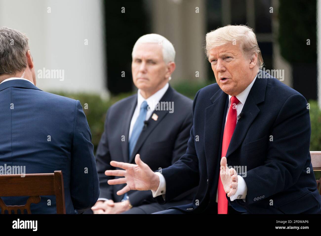 President Donald Trump participates in a virtual Fox News Town Hall Tuesday March 24 2020 in the Rose Garden of the White House. Stock Photo