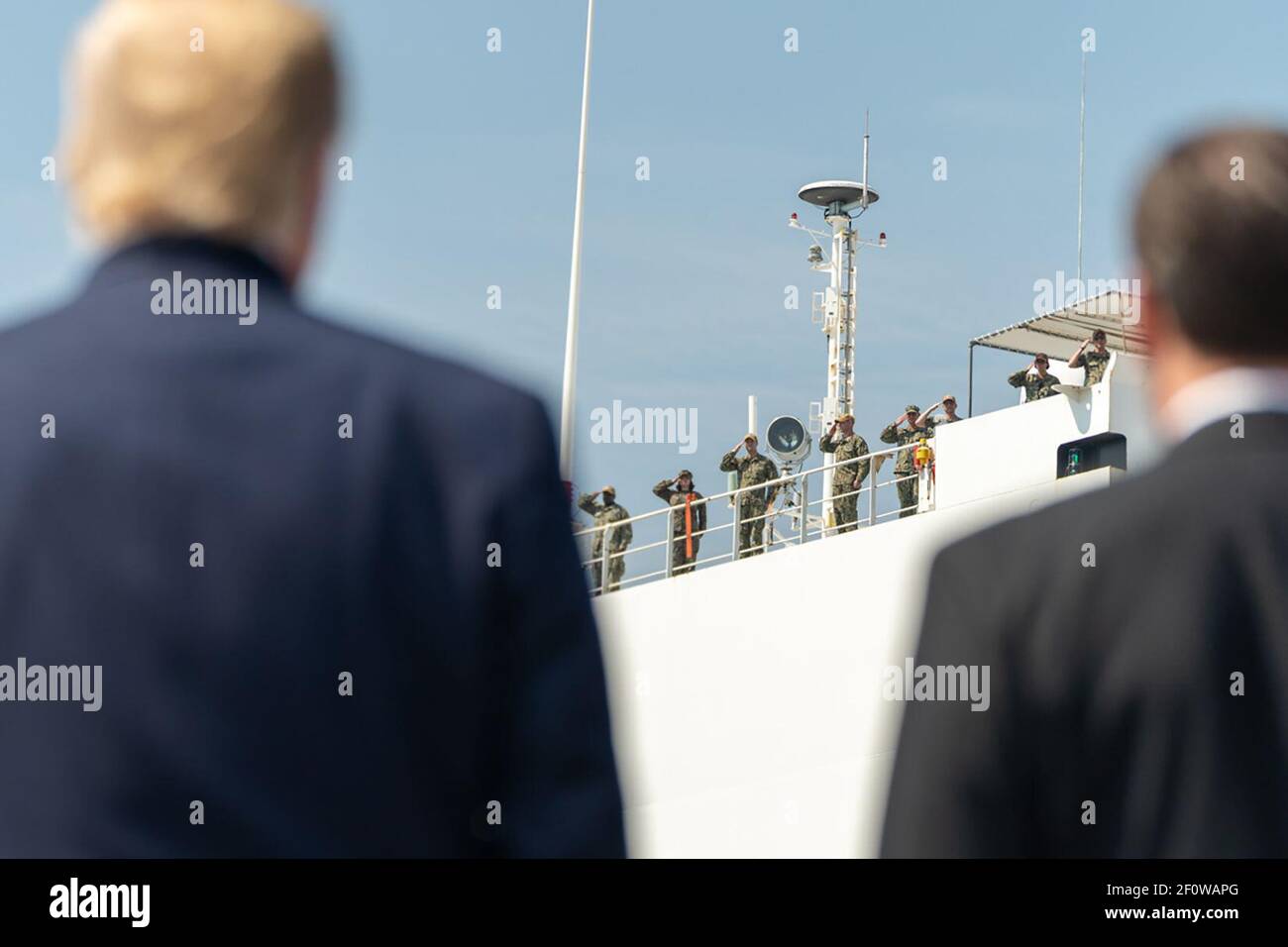 President Donald Trump joined by Secretary of Defense Mark Esper sees off the USNS Comfort Saturday March 28 2020 as she departs Naval Air Station Norfolk Pier 8 in Norfolk Virginia and sets sail for New York City. Stock Photo