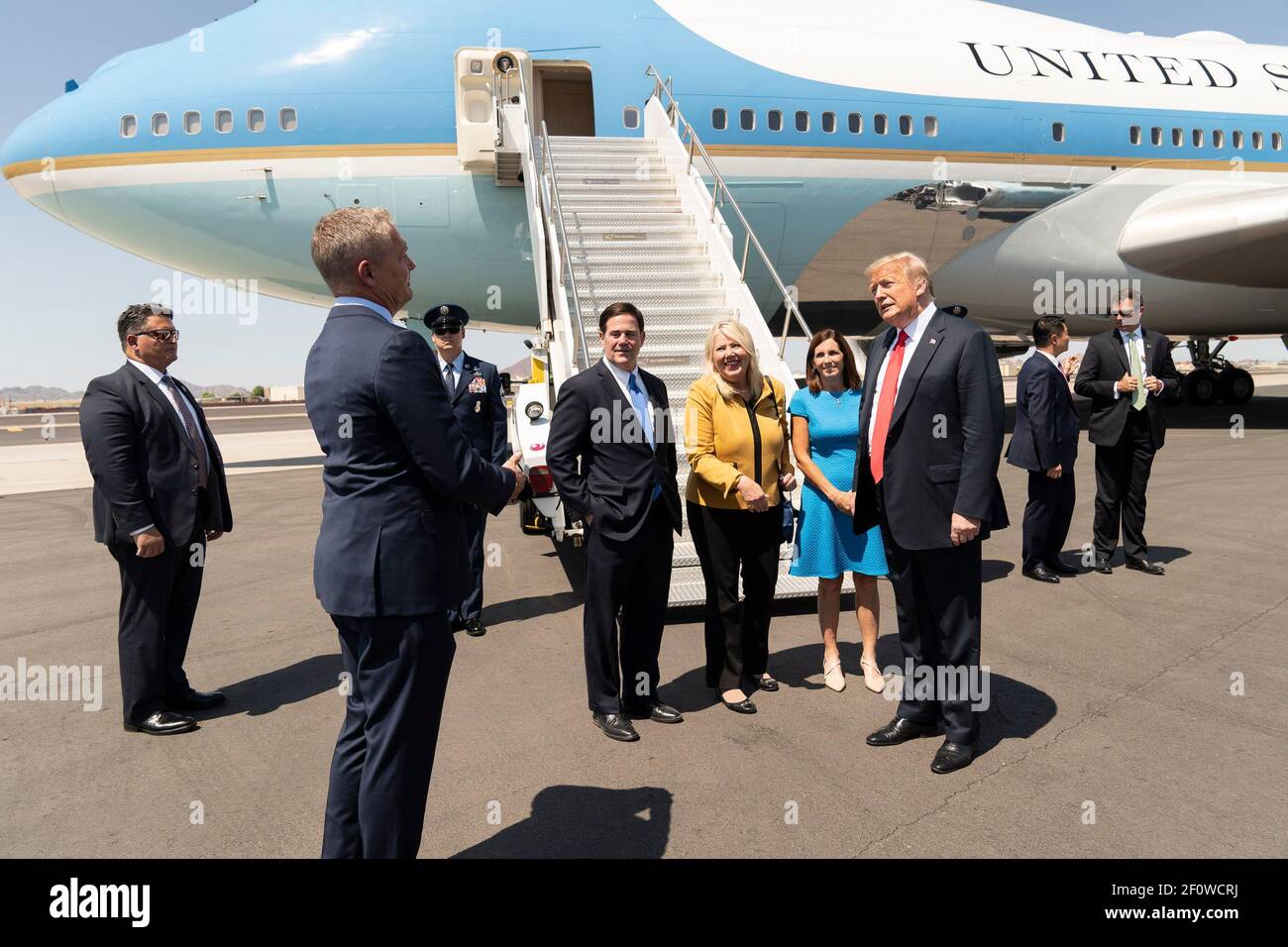 President Donald Trump joined by Arizona Governor Doug Ducey; Senator Martha McSally R-AZ and Rep. Debbie Lesko R- AZ is met by Clint Hickman Vice Chairman of Arizonaâ€™s 4th District on the Maricopa County Board of Supervisors upon the President's arrival Tuesday June 23 2020 at Phoenix Sky Harbor International Airport in Phoenix. Stock Photo