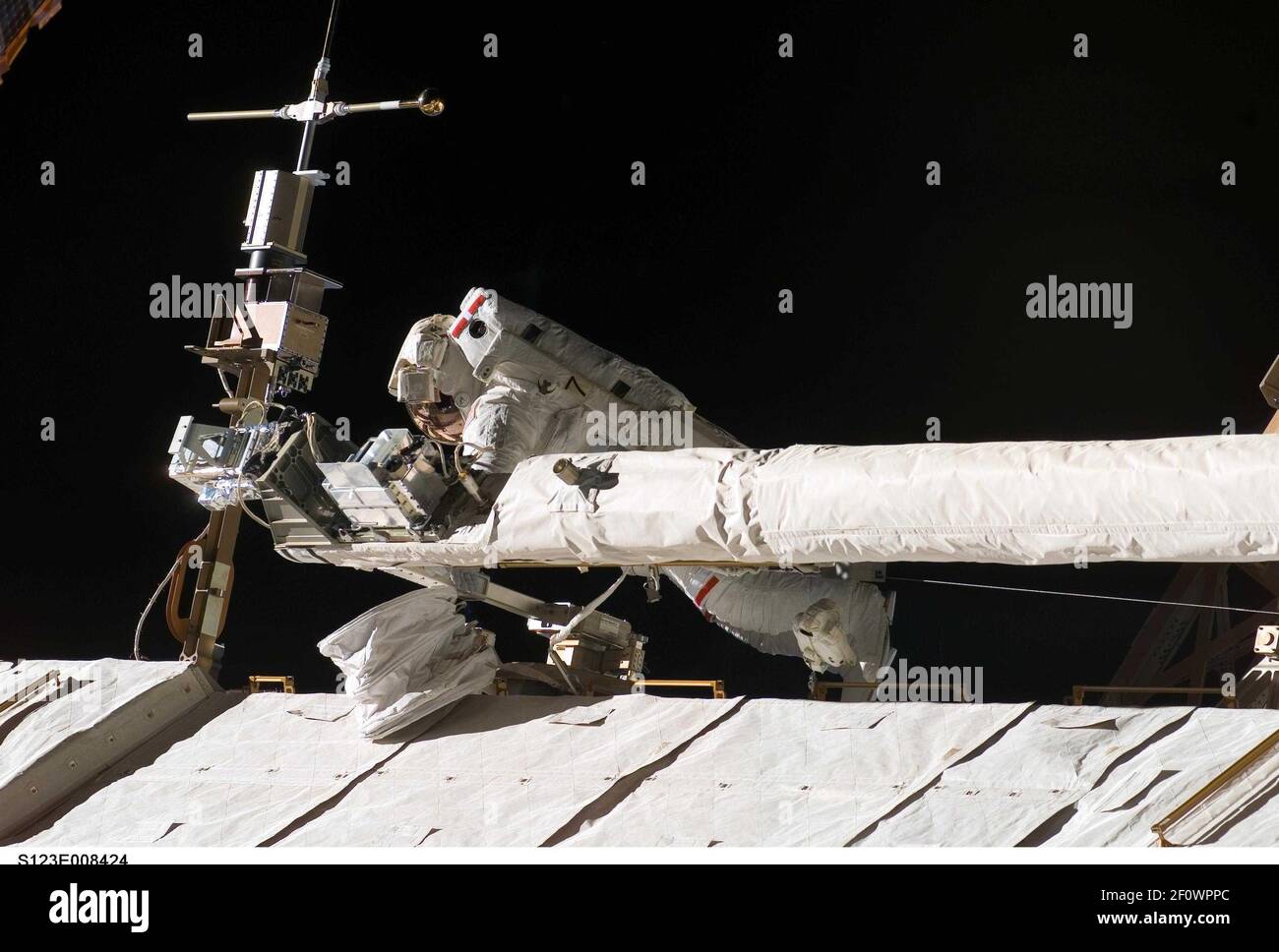 Mike Foreman Finalizing the MissionSTS-123 mission specialist Mike Foreman helps to ...
