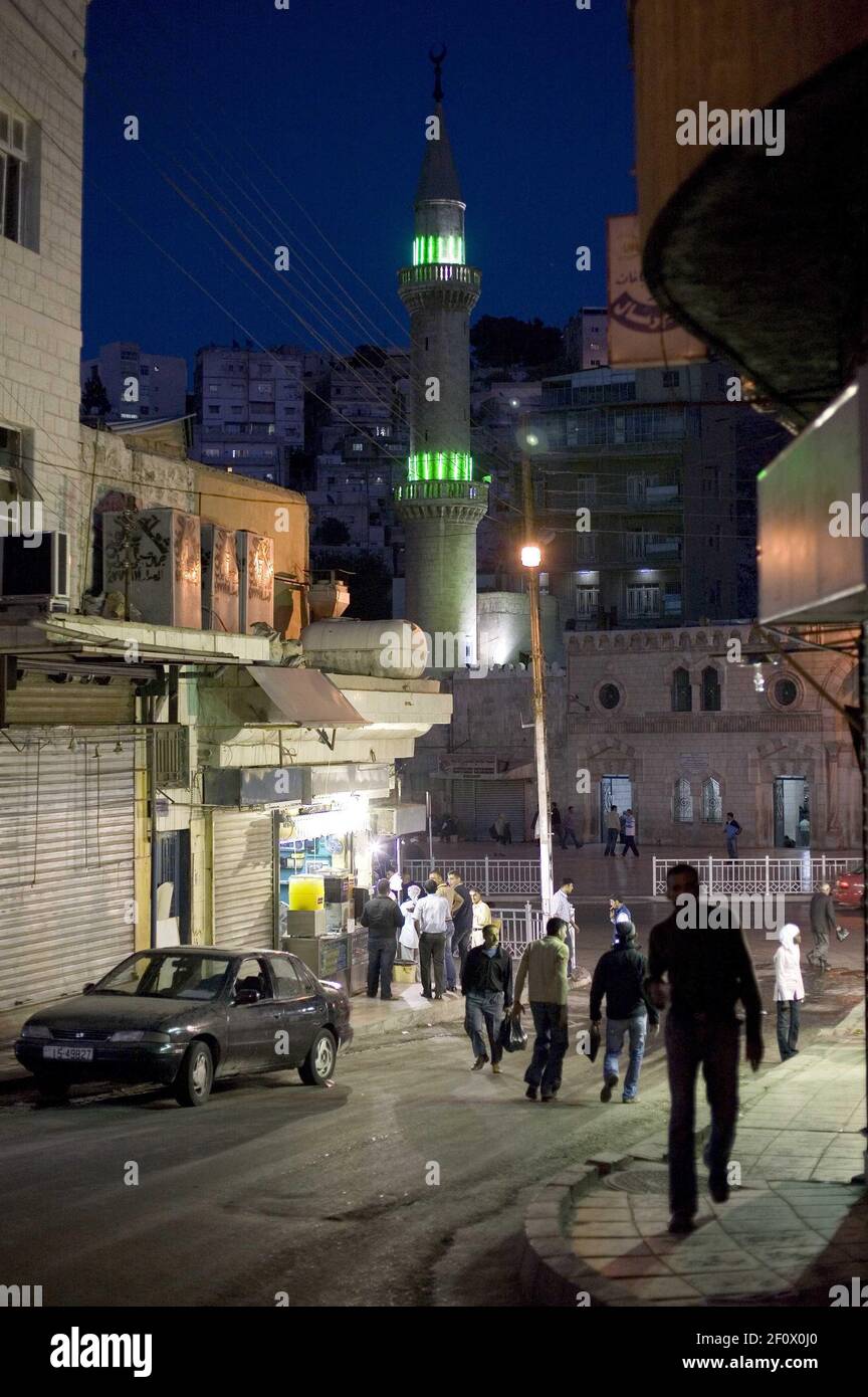 April 2008- Amman, Jordan- Green lights illuminate a minaret on the King  Hussein Mosque in Downtown Amman. Jordan is a country with a rich history  full of historical sites, but located in