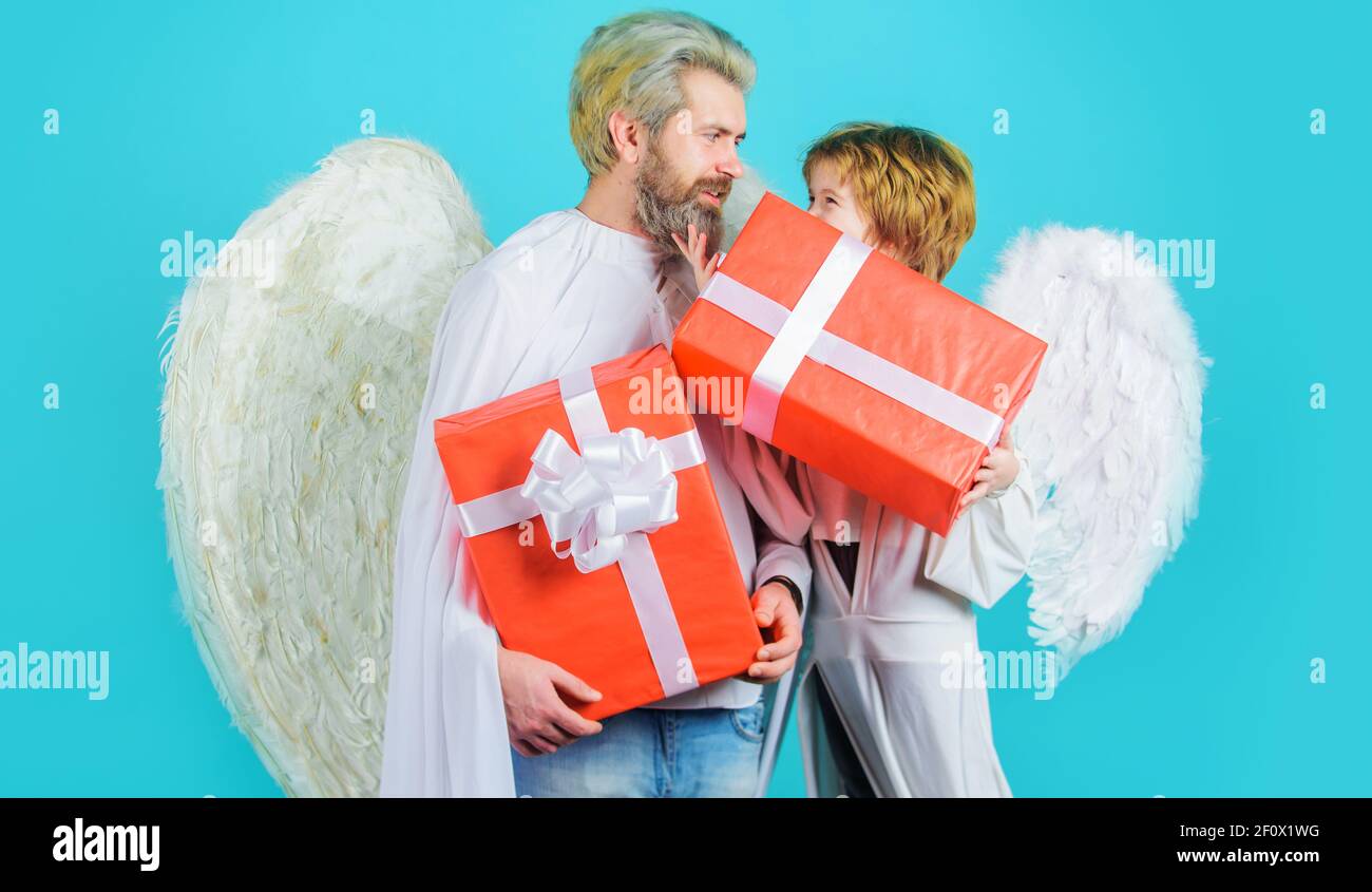 Fathers day. Father and son Angels with present. Valentines angels with