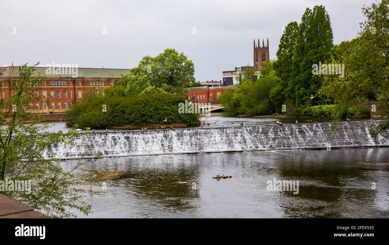 Derby UK May 24, 2020: The river Derwent in Derby City Center showing weir, Council House and Cathedral Stock Photo