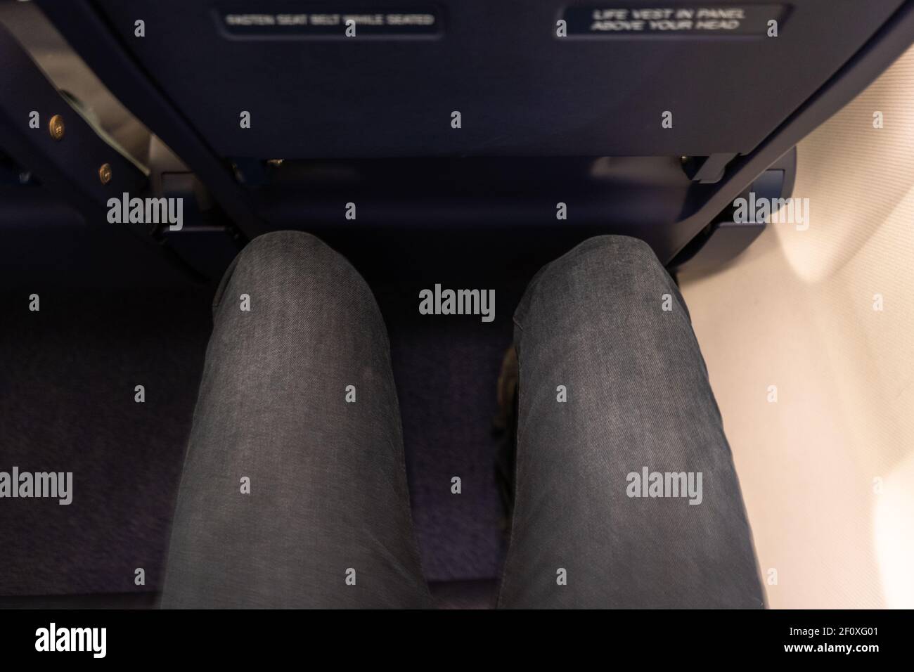 Top view of the legroom in the seat of a passenger plane.