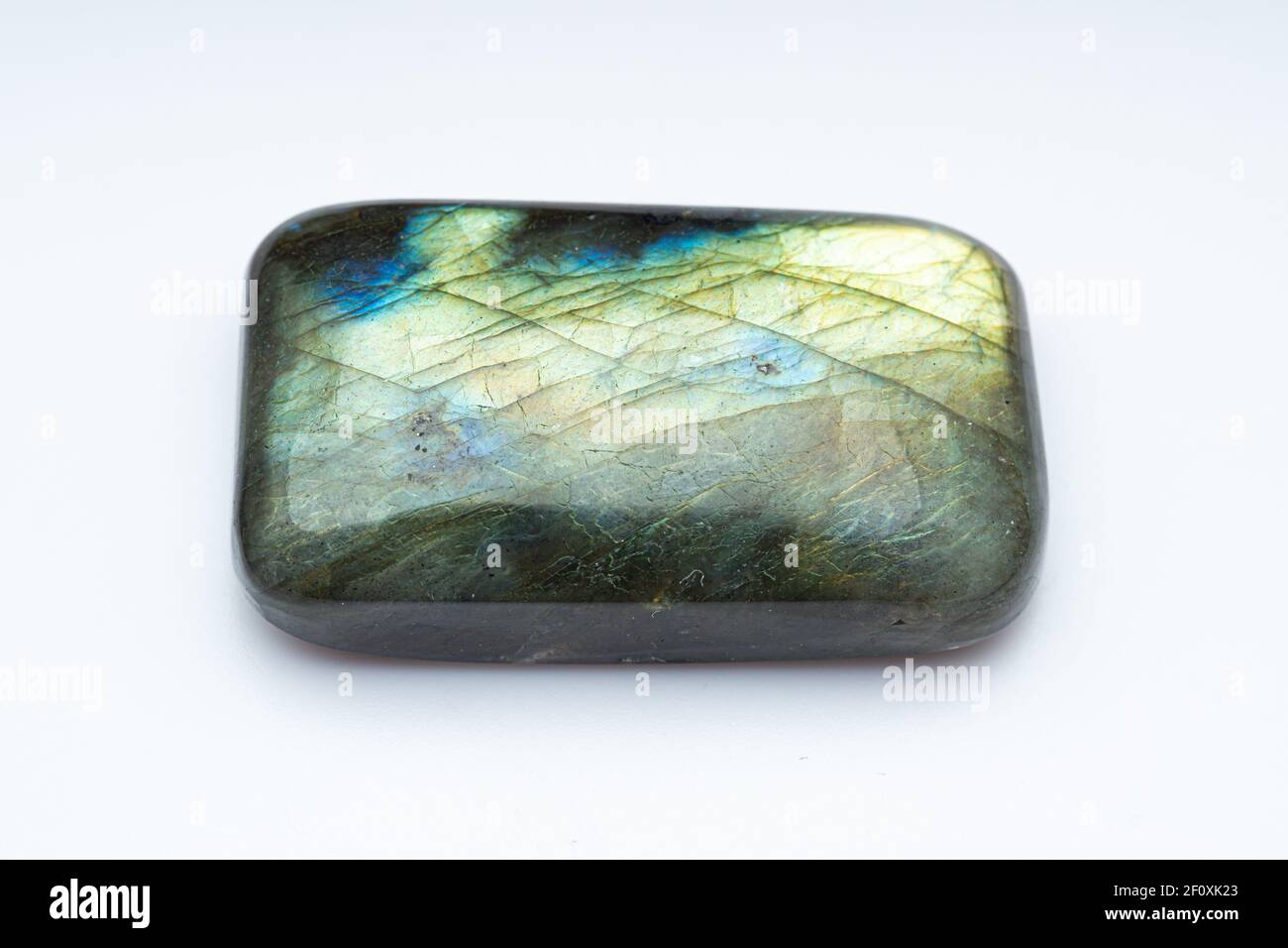 Natural stone labradorite on a white background Stock Photo - Alamy