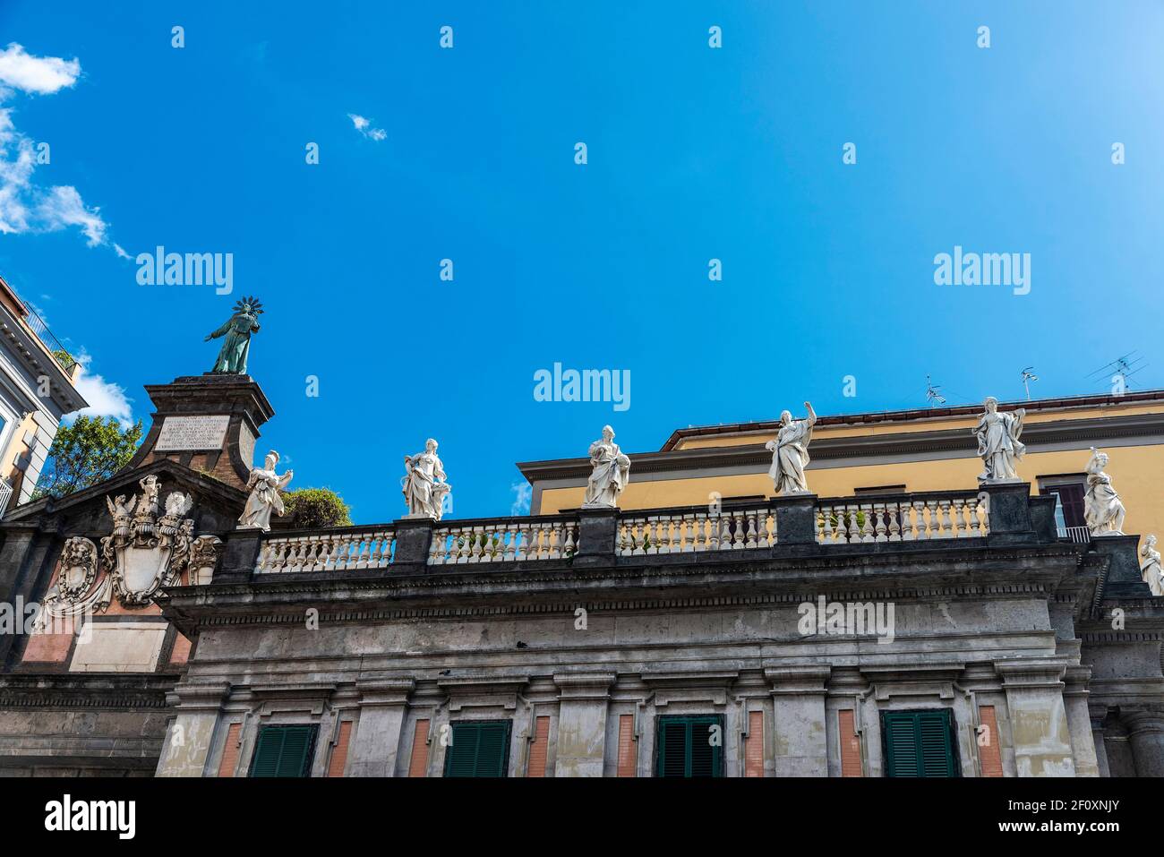 Statues on the facade of the Convitto Nazionale Vittorio Emanuele II in the Piazza Dante in