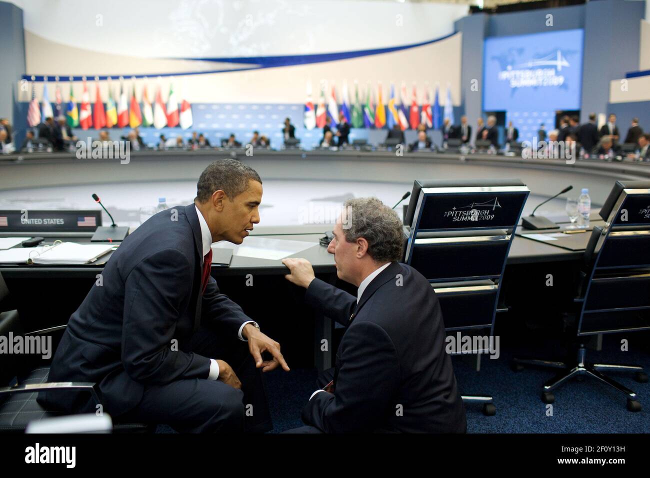 President Barack Obama talks with Mike Froman, during the afternoon session of the G-20 Pittsburgh Summit in Pittsburgh, Sept. 25, 2009 Stock Photo
