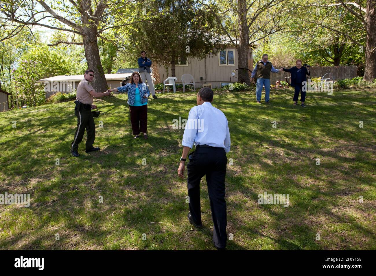 President Barack Obama greets neighbors across the road from MogoOrganic farm in Mount Pleasant Iowa April 27 2010. Stock Photo