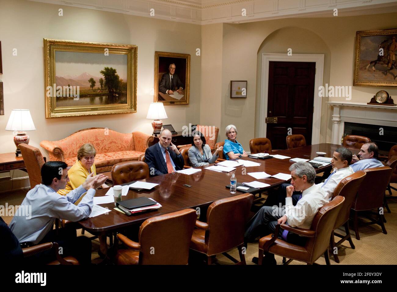 President Barack Obama attends a health care meeting in the Roosevelt Room of the White House,  August 7, 2009.  From left; Peter Orszag,  Christy Romer, Phil Schiliro, Nancy-Ann Deparle, Kathleen Sebelius, Chief of Staff Rahm Emanuel, President Obama, and David Axelrod Stock Photo